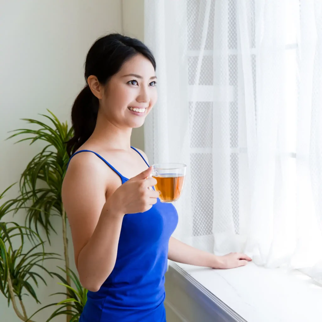 A girl enjoying the bhumika dahasamani drink