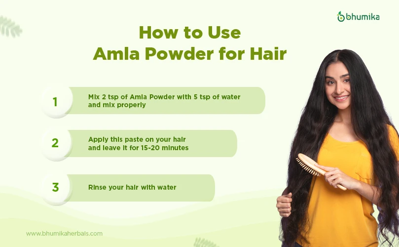 a lady using amla powder for hair